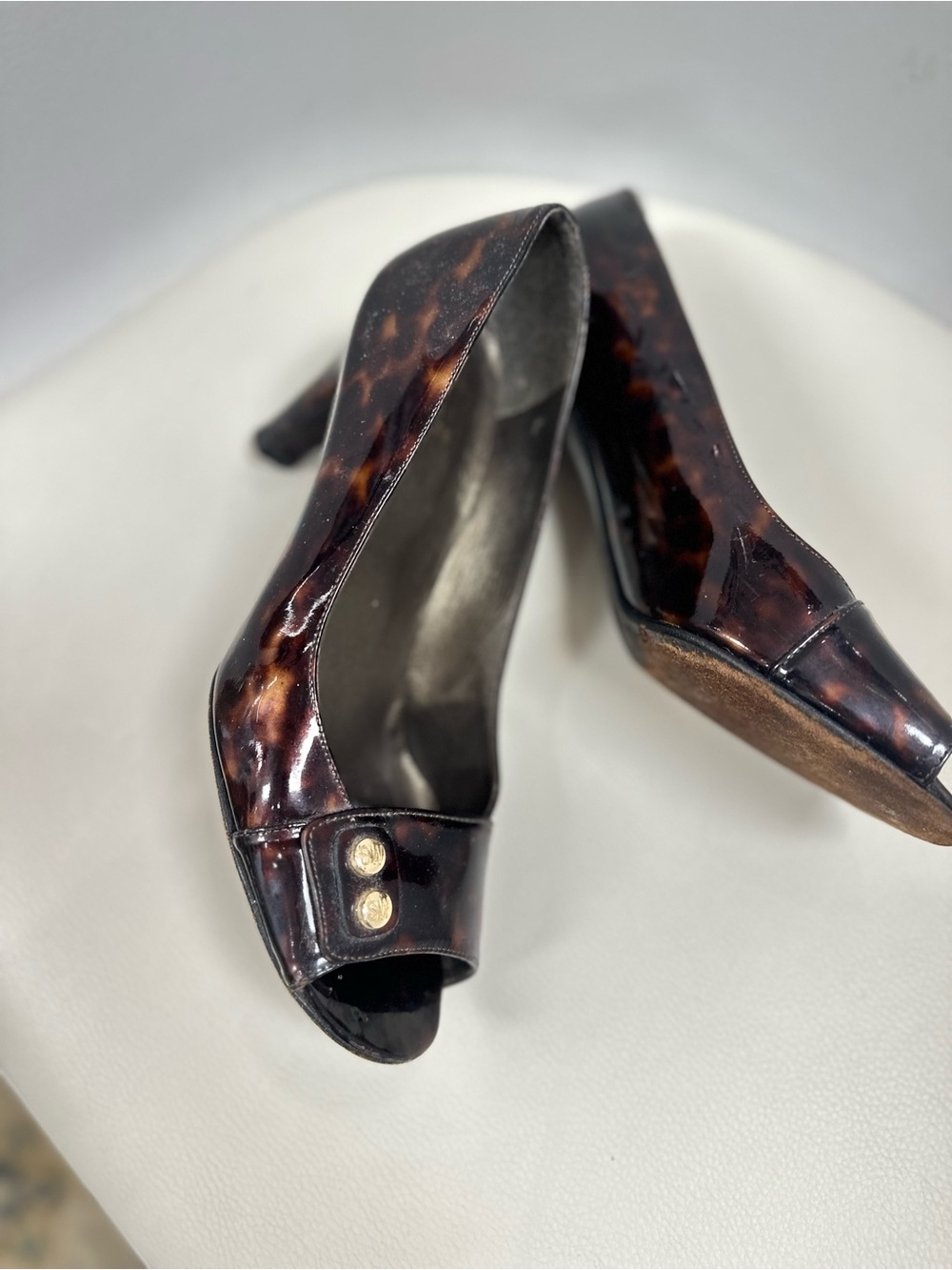Stuart Weitzman Tortoiseshell Patent Leather Mid-Heel Pumps with Gold Accents